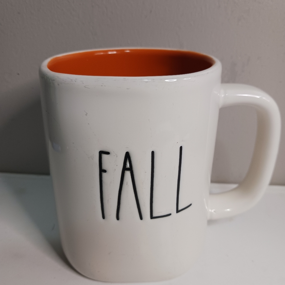 Ray d u n n mug by magenta, white and orange,